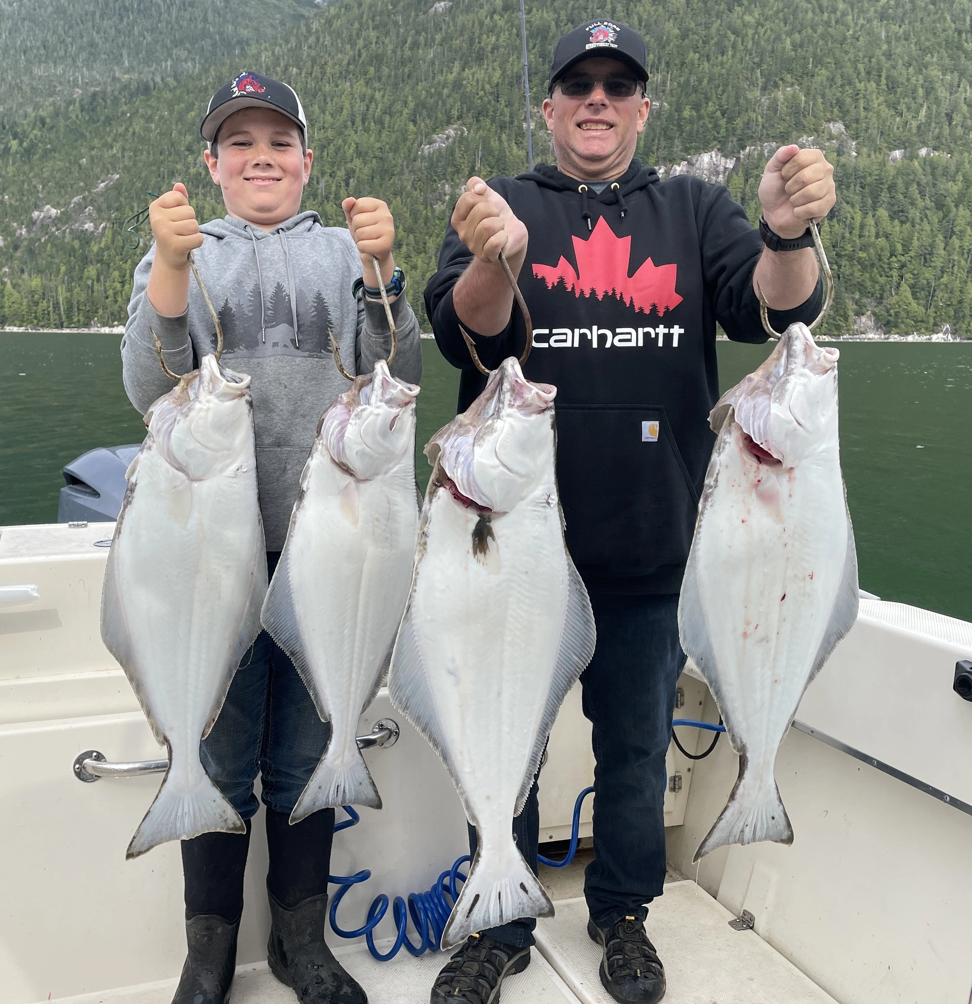 Family with halibut catch on Kitimat fishing charter